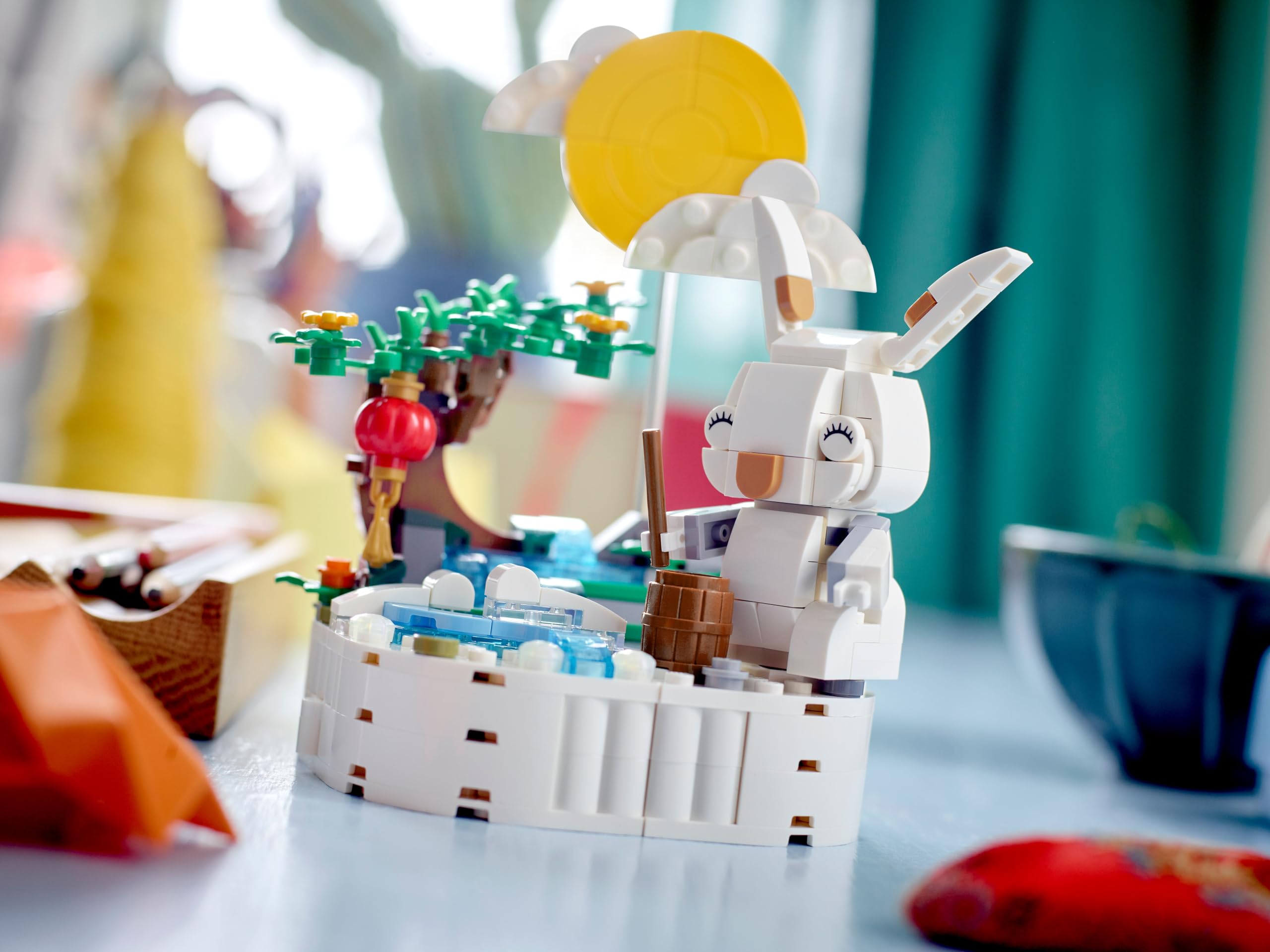 LEGO Jade Rabbit waterfall scene with lunar backdrop and festive ambiance