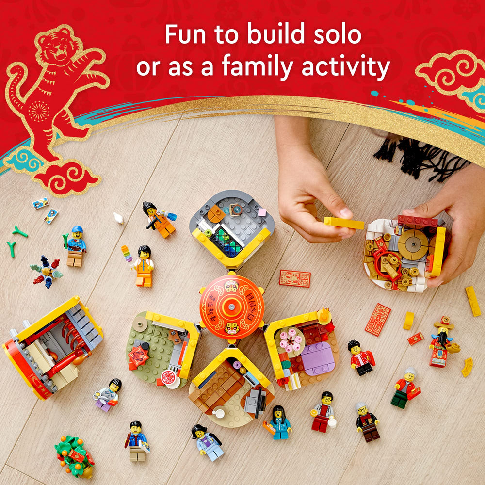 LEGO 80108 scene six with the family group and God of Wealth facilitating storytelling.