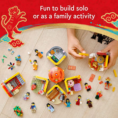 LEGO 80108 scene six with the family group and God of Wealth facilitating storytelling.