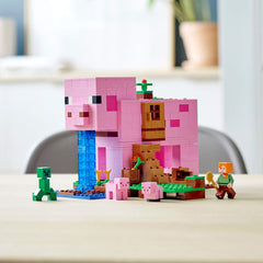 Two pig figures complete the farm vibe and mini-care routines for kids