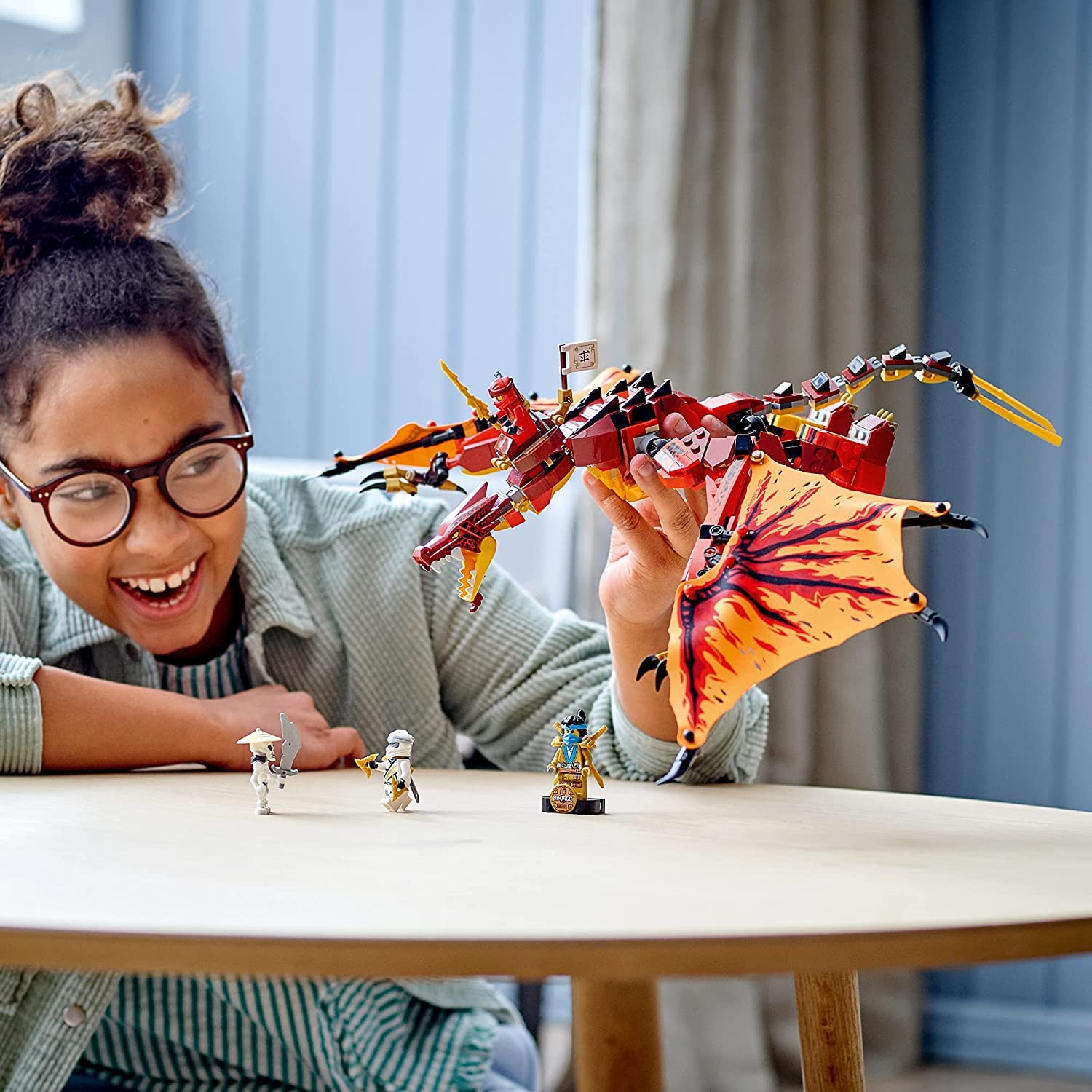 LEGO NINJAGO Fire Dragon Attack dragon saddle and rider stand for poseable play.
