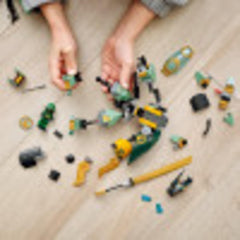 LEGO NINJAGO Lloyd’s Hydro Mech cockpit opens to reveal Lloyd inside.