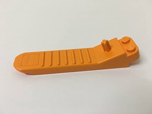 LEGO orange brick and axle separator tool in use, keeps bricks intact during separation.