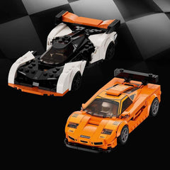 Two LEGO minifigures ready to pilot the McLaren cars