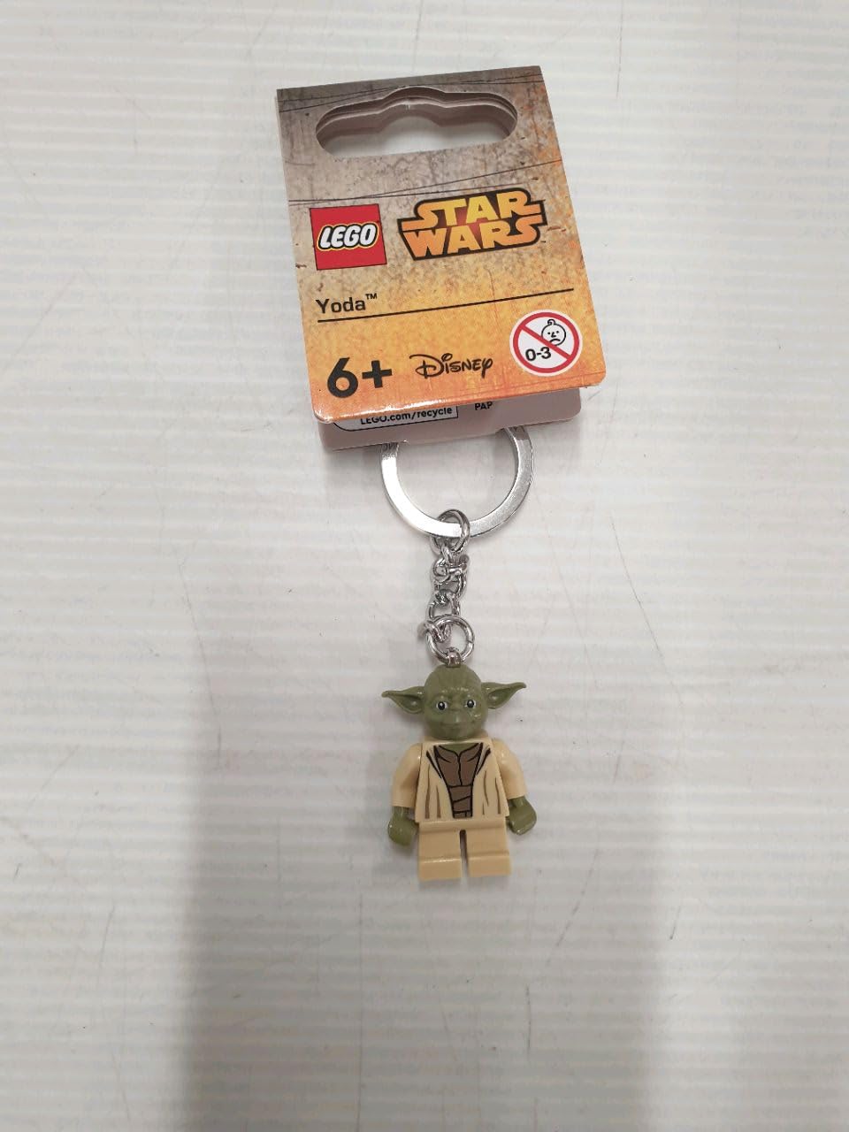 LEGO Yoda keychain side angle showing sturdy ring for daily carry