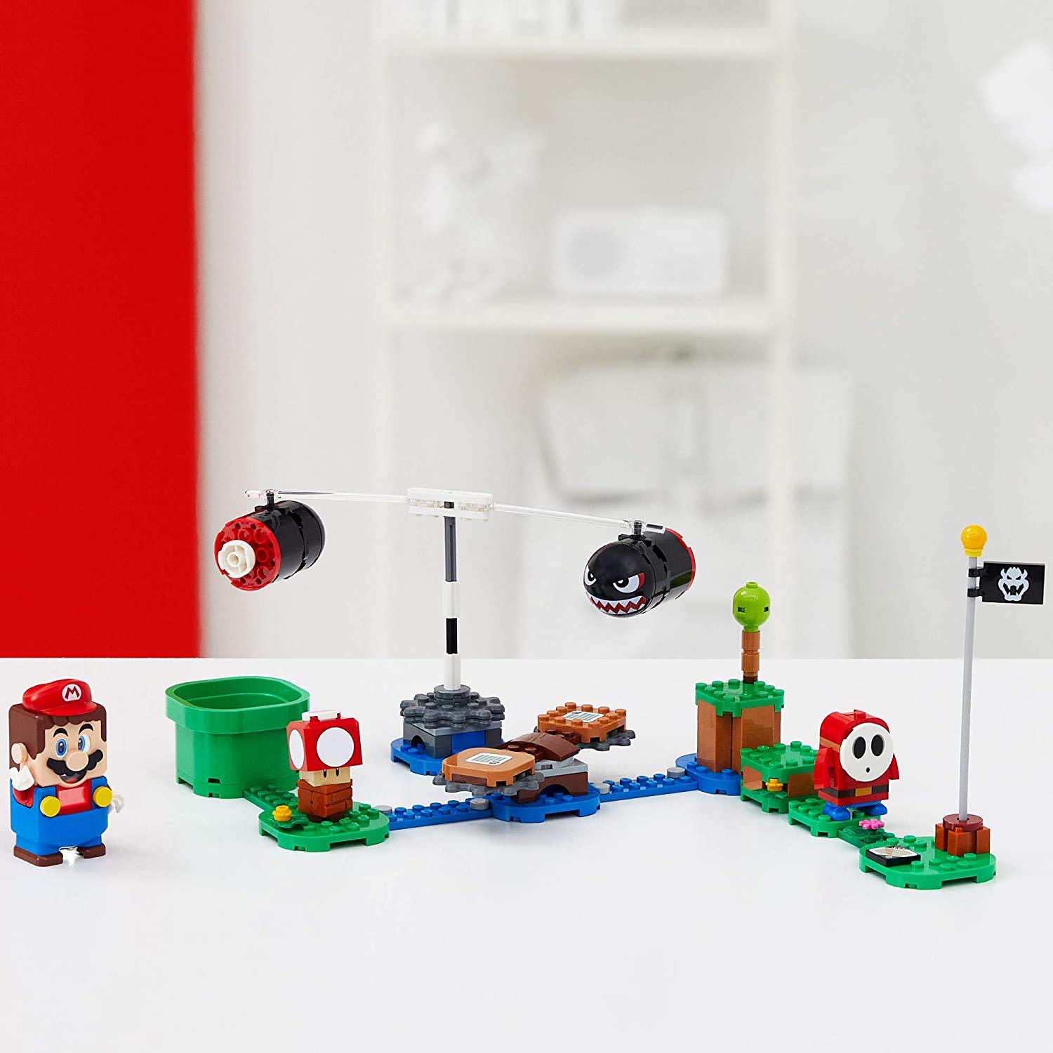 LEGO Super Mario on platform shows Mario interacting with the set.