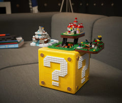 LEGO Super Mario question block with Lakitu and penguin creates seasonal display.