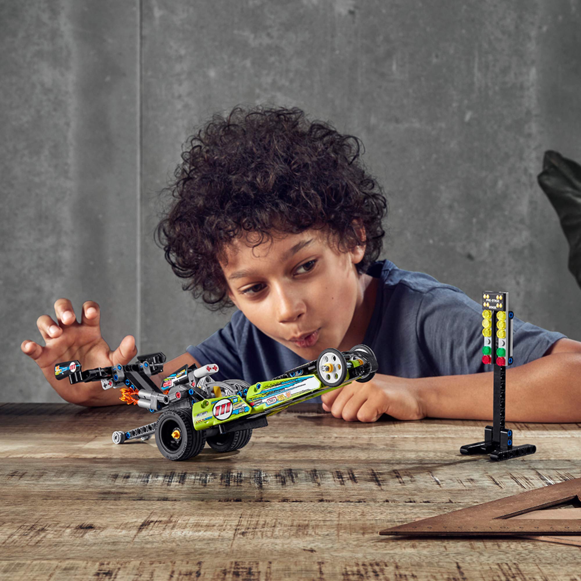 LEGO Technic Dragster wheelie-bar detail enhances stunt play