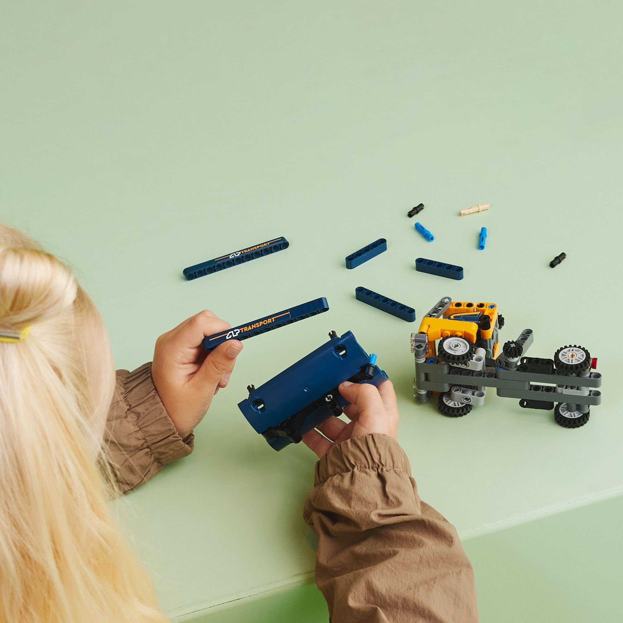 LEGO Technic Dump Truck 42147 tipper-lift detail demonstrating load-dropping action