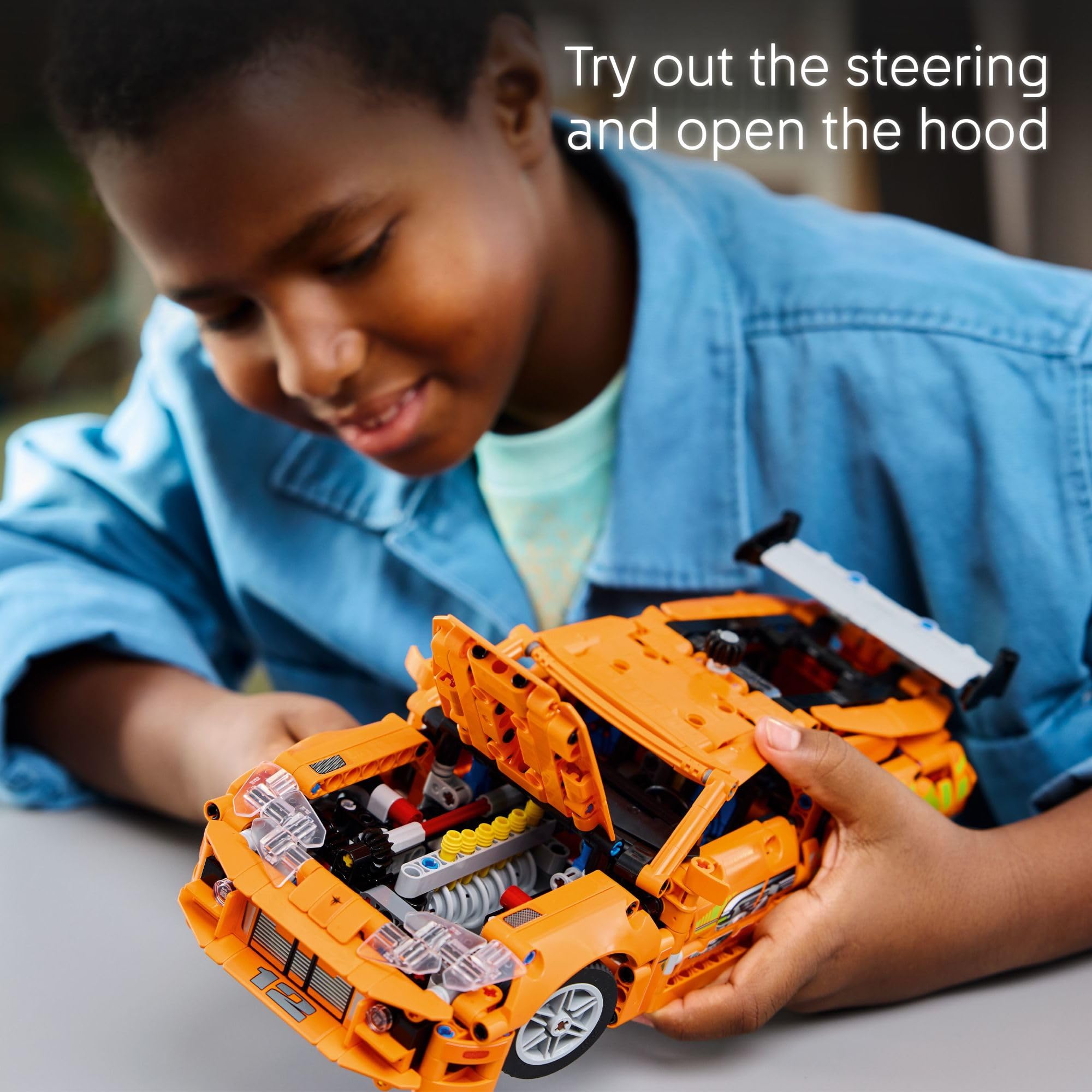 LEGO Technic Toyota Supra MK4 steering-action captures responsive handling during play.