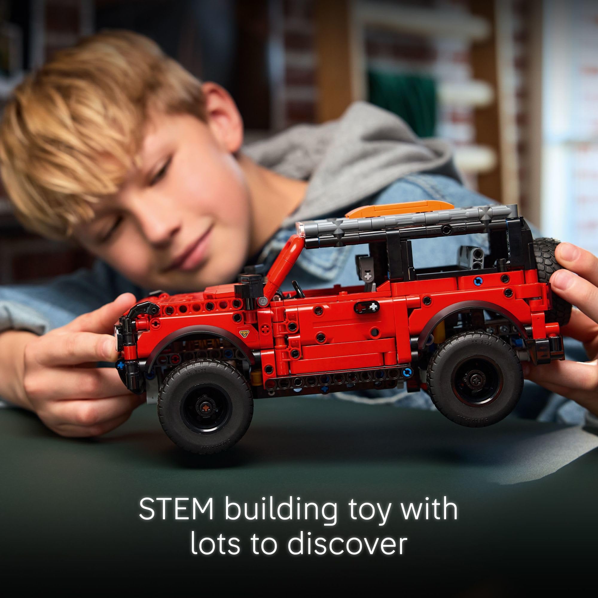 LEGO Technic Ford Bronco opening doors for interactive play and display appeal.
