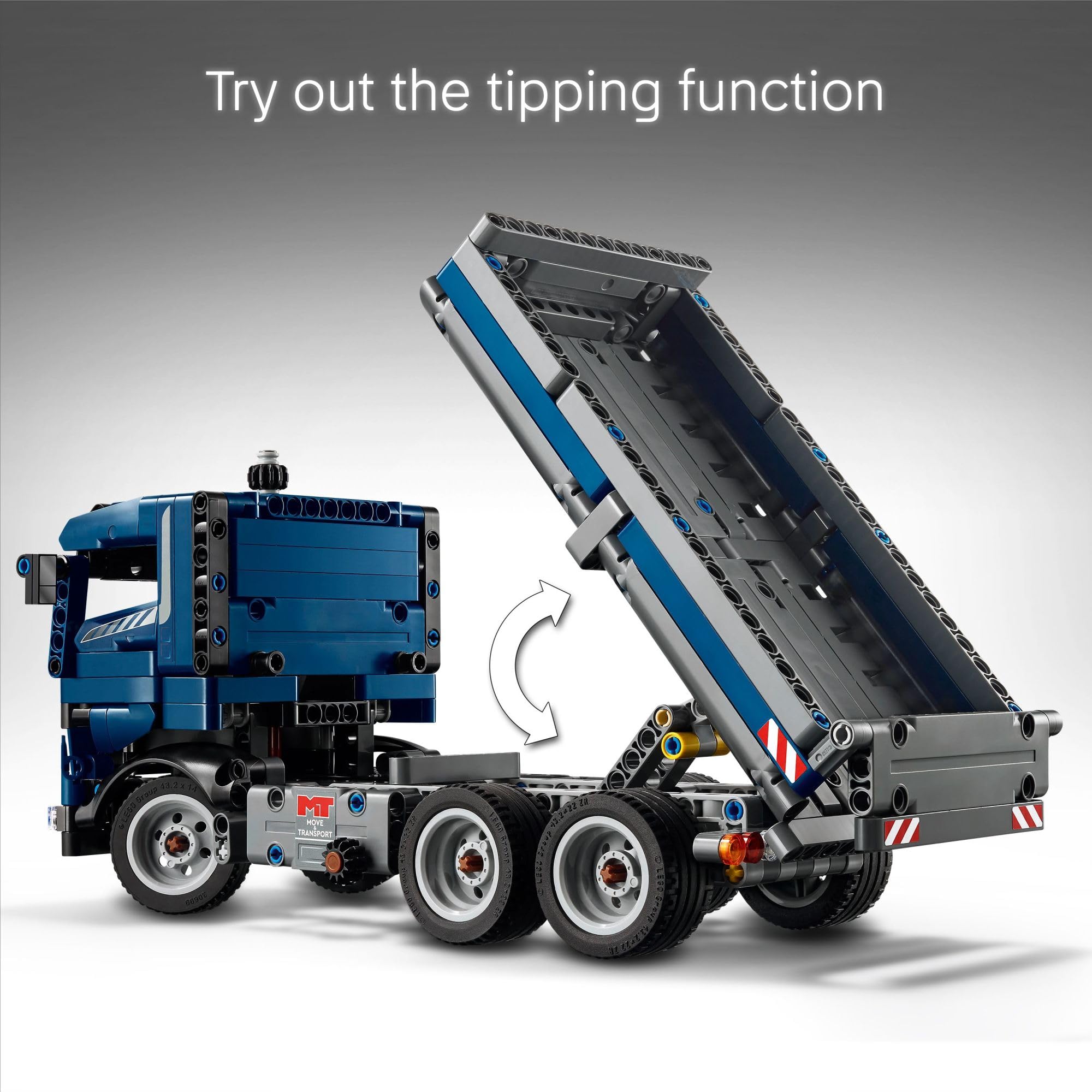 LEGO Technic tipping dump truck cab doors open revealing interior details