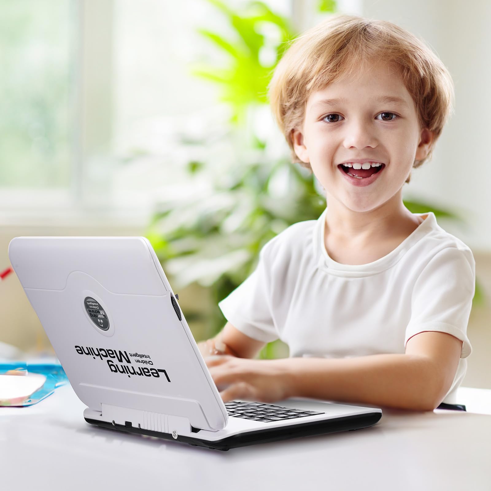 LESHITIAN Kids Laptop packaging contents including manual and mouse