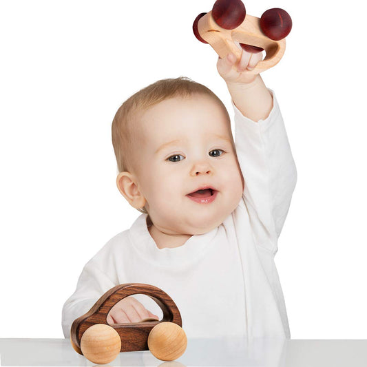 Let's Make wooden car with movable wheels supports early motor skill development.
