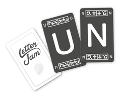 Letter Jam box contents featuring letter cards and rulebook.