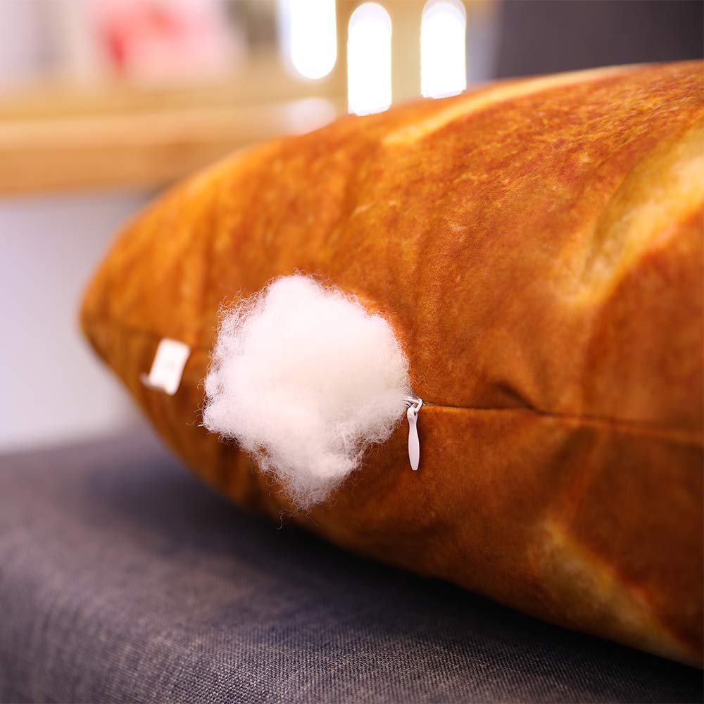 Levenkeness bread cushion enhances home decor with whimsy.