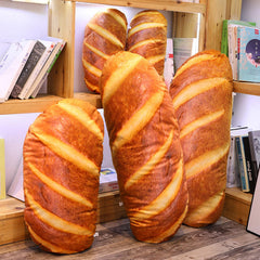Levenkeness bread pillow on sofa inspires relaxed lounging and conversation.