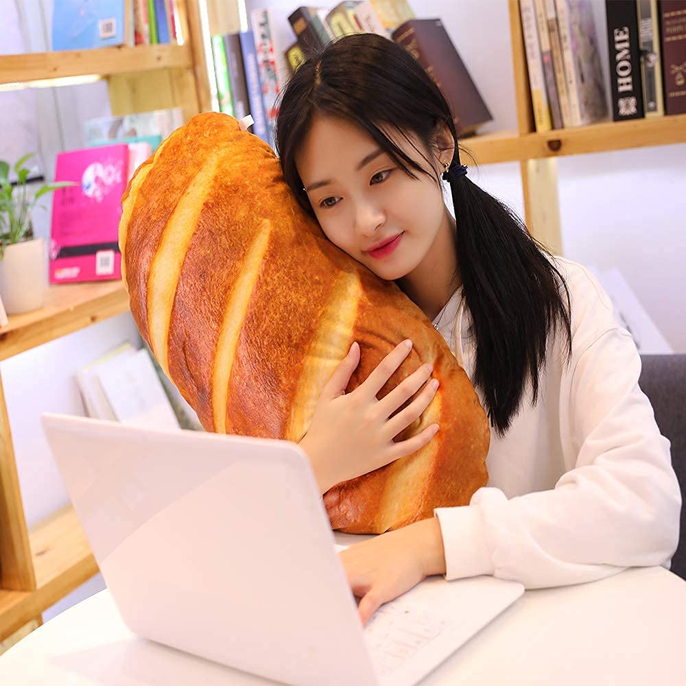 Levenkeness bread pillow with detailed print for lifelike charm.