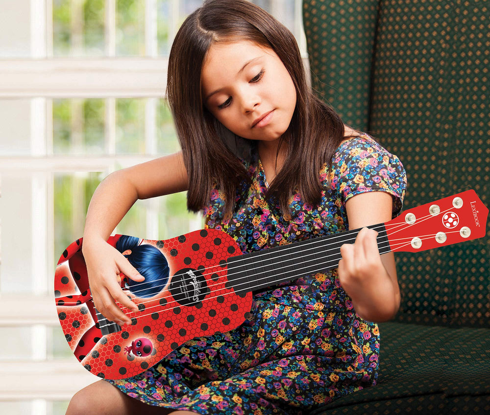 LEXiBOOK Miraculous Ladybug guitar nylon strings close-up, durable and kid-friendly