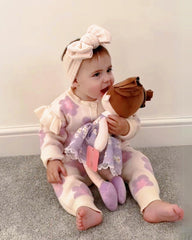 LeyaDoll safety certifications closeup highlights CPSIA and CCPSA compliance for peace of mind.