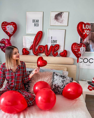 LHOAVWE Valentine balloons arranged as a vibrant backdrop for celebrations.