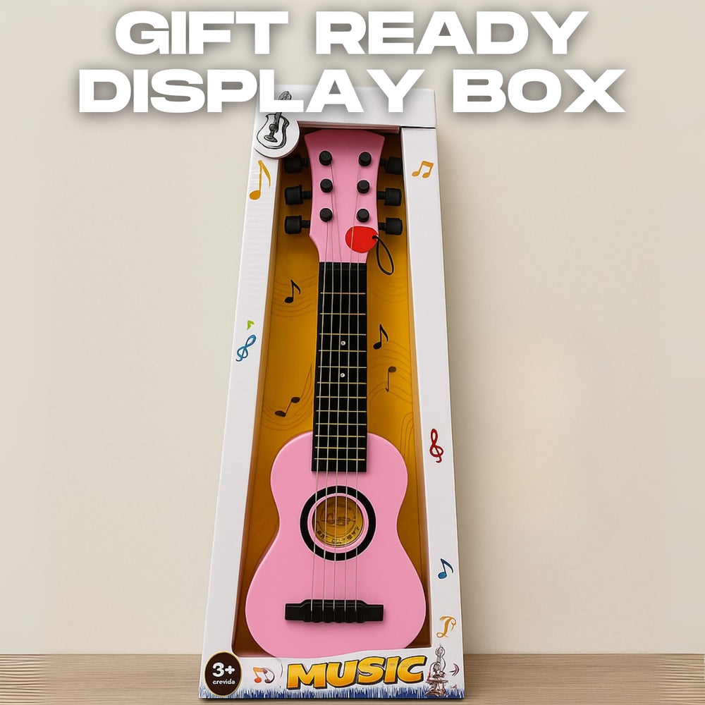 Liberty Imports 23-inch pink kids guitar in use for beginner practice