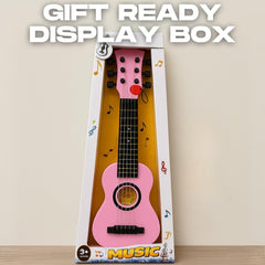 Liberty Imports 23-inch pink kids guitar in use for beginner practice