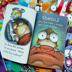 Children reading Limonuos Fly Guy books, boosting imagination and reading confidence.