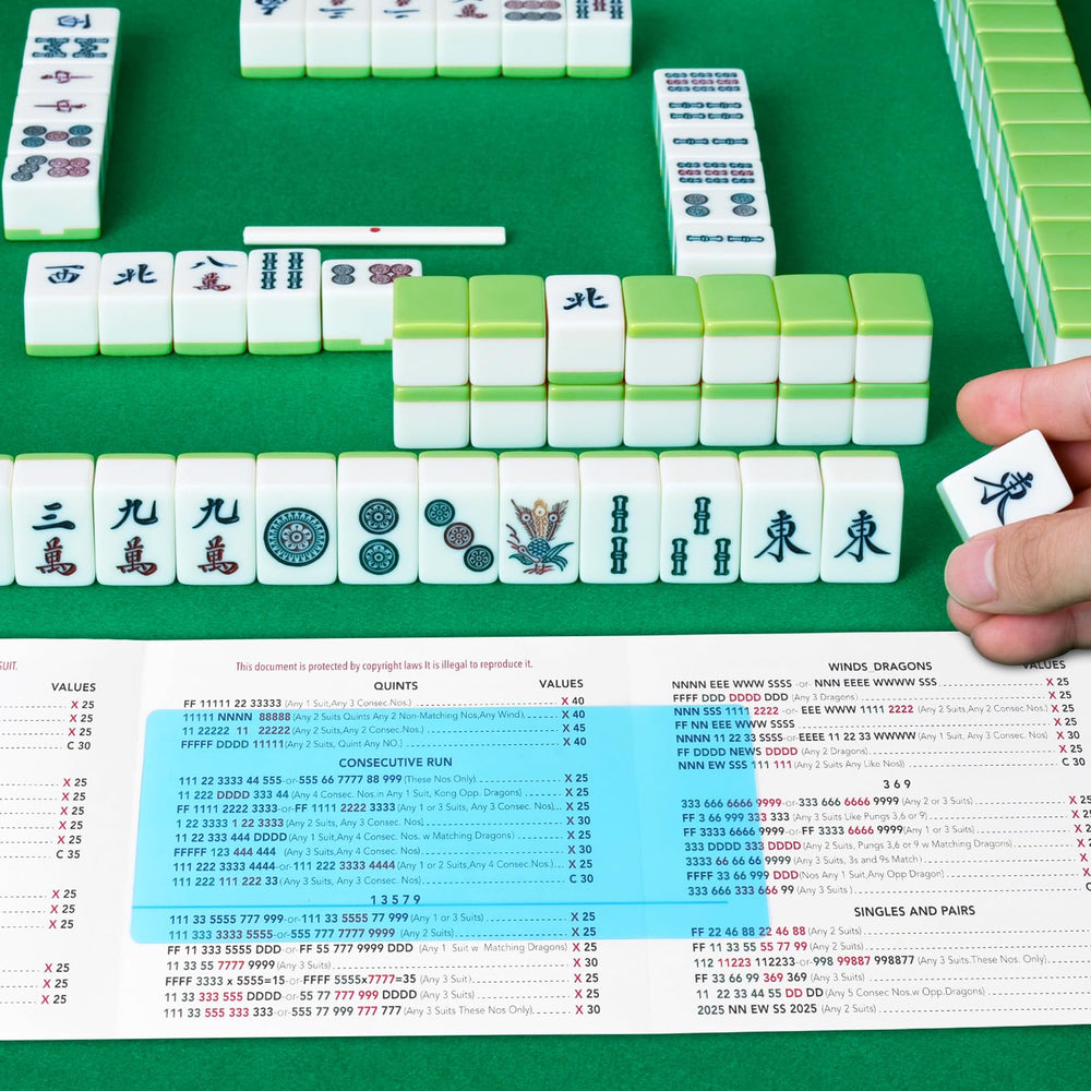 Peel-off sheet reveals clear rules on Linastu Mahjong Line Finder.