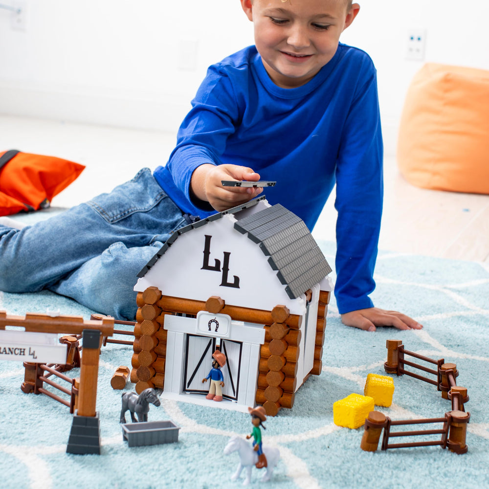 Lincoln Logs Big Sky Ranch barn doors in motion invite interactive storytelling