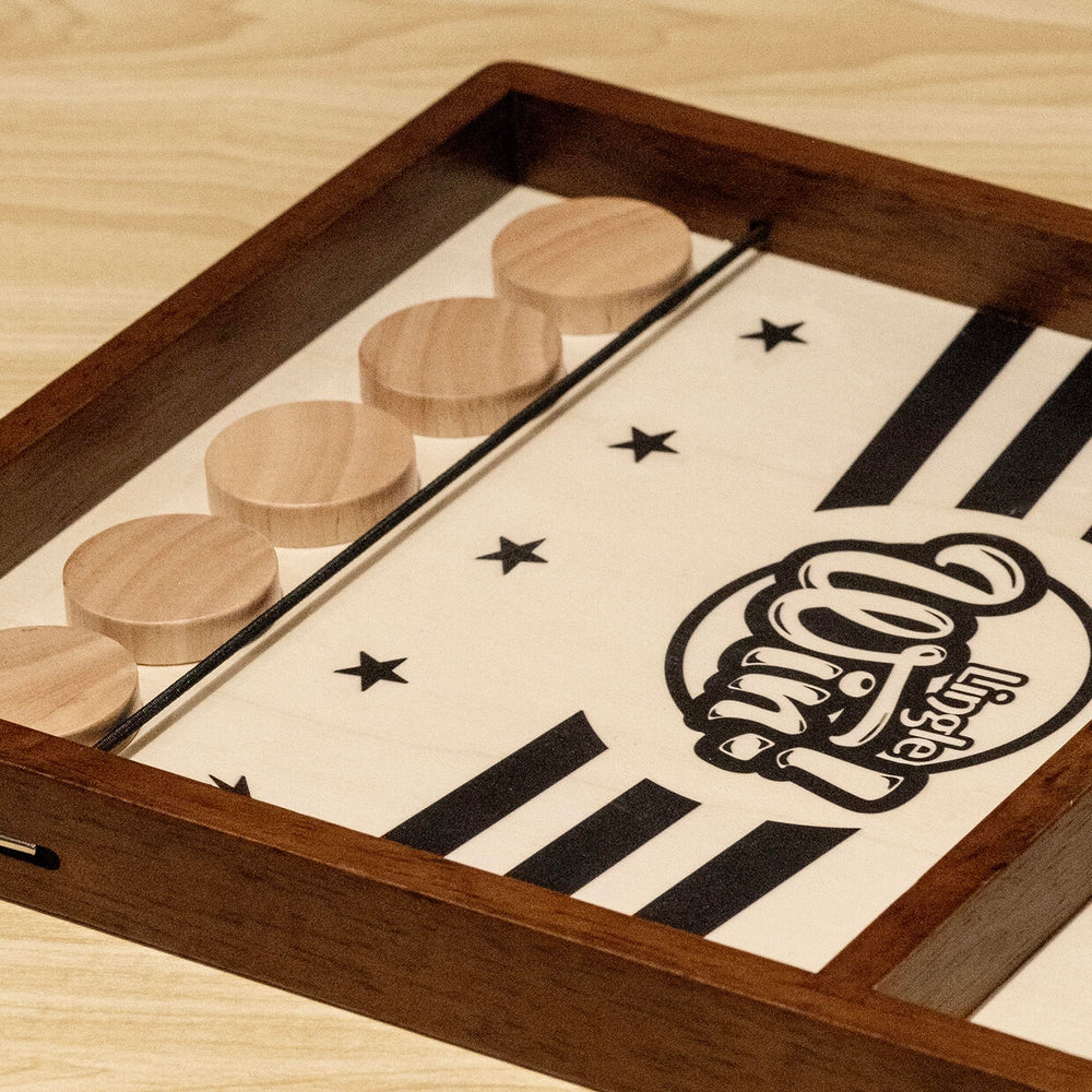 Lingle Sling Puck Game pucks ensure smooth play and quick scoring.