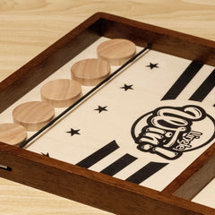 Lingle Sling Puck Game pucks ensure smooth play and quick scoring.