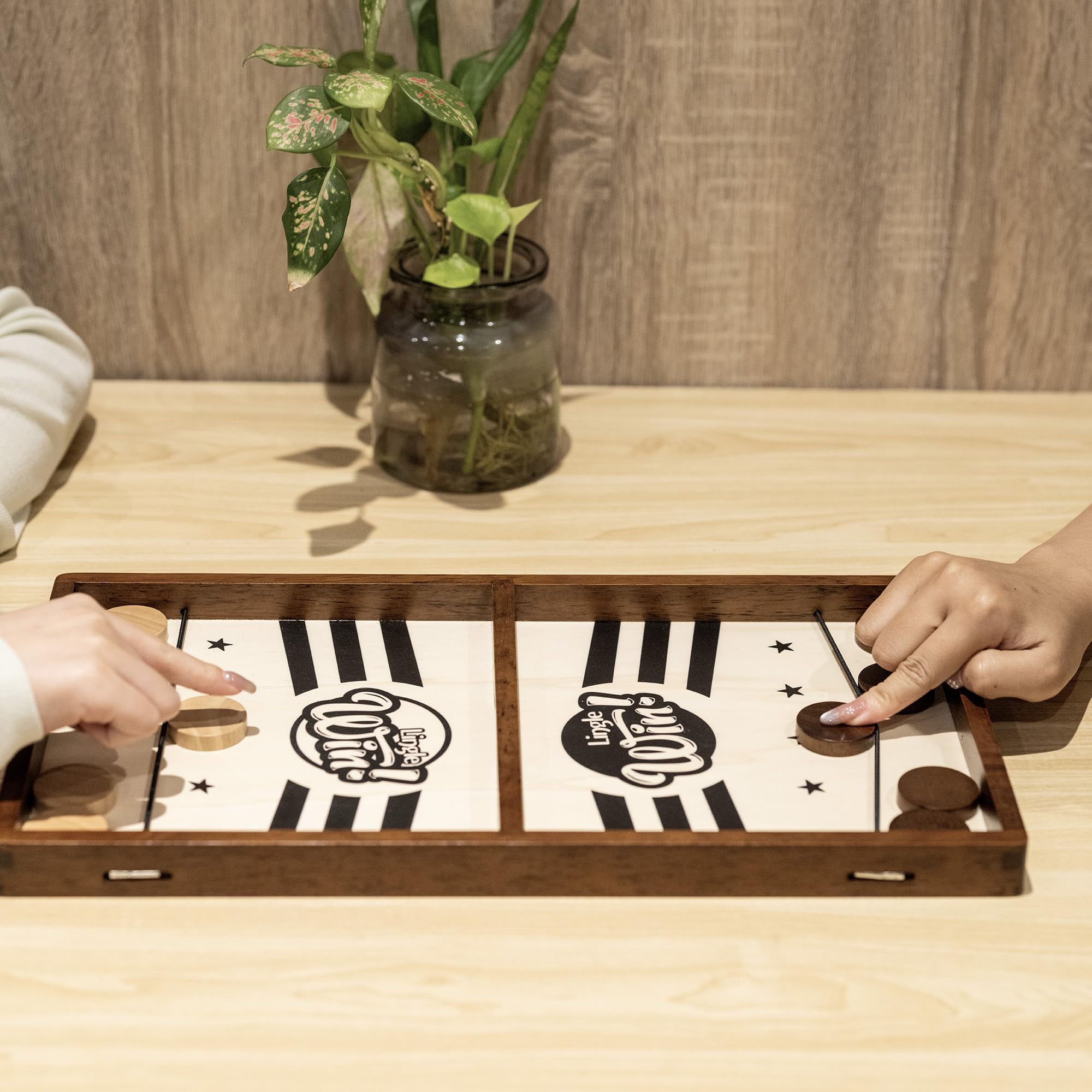Lingle Sling Puck Game tabletop play fits on desks or coffee tables.