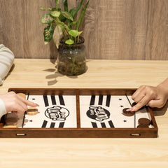Lingle Sling Puck Game tabletop play fits on desks or coffee tables.