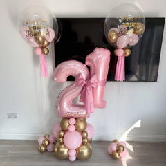 Lingqiang indoor-outdoor ready decor with bright pink foil balloons.