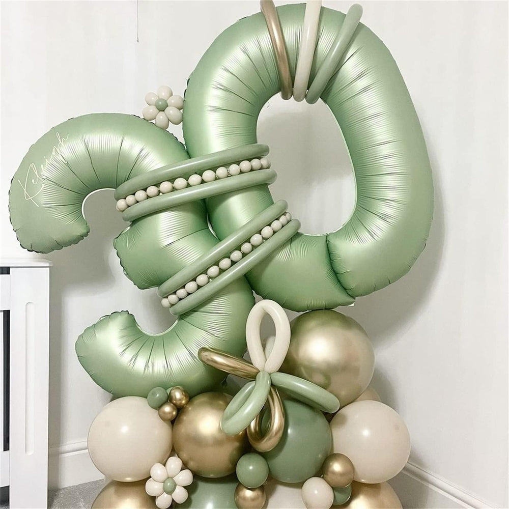 Lingqiang sage green balloon with straw deflation accessory for reuse.