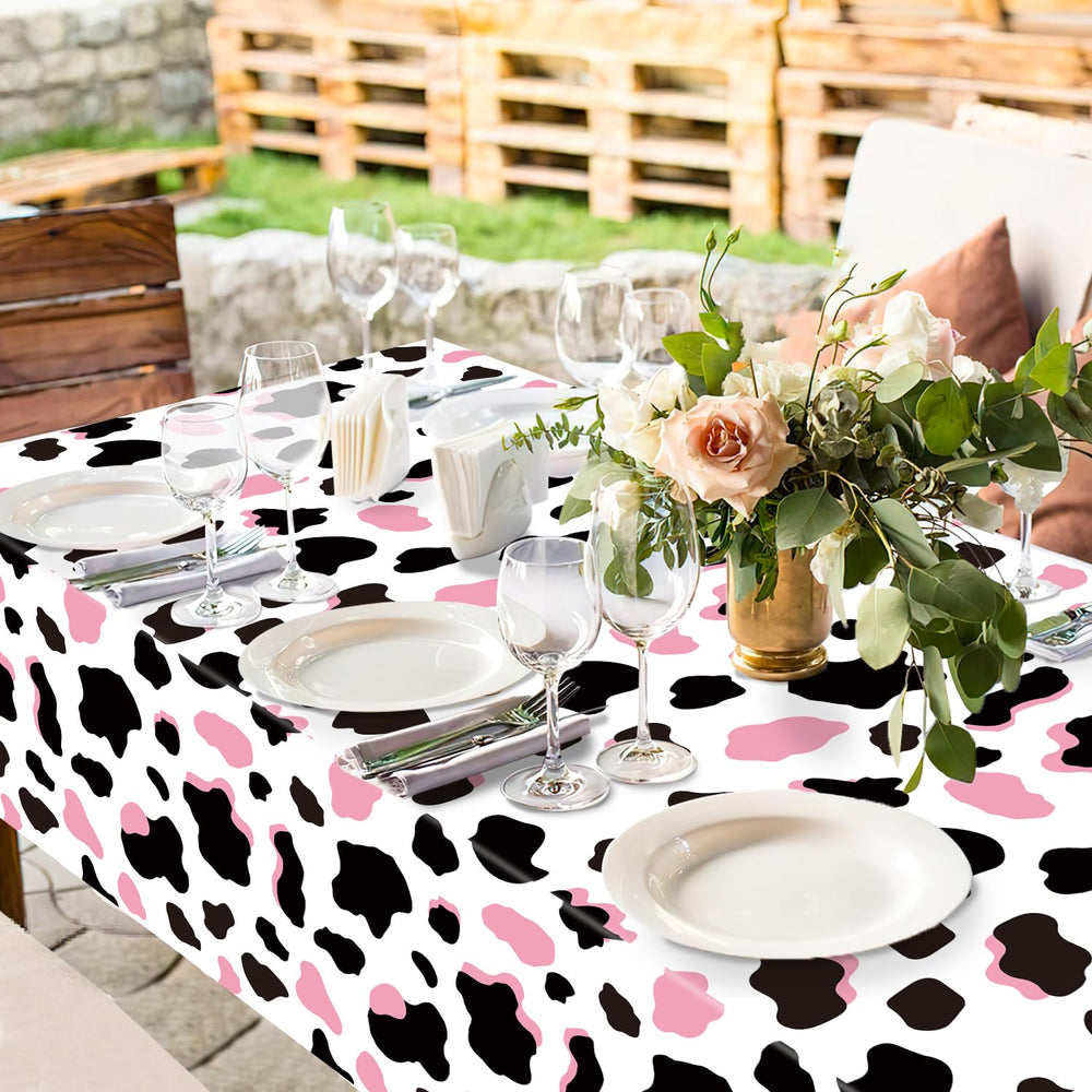 LINHAXM pink cow print tablecloth neatly folded for storage after an event