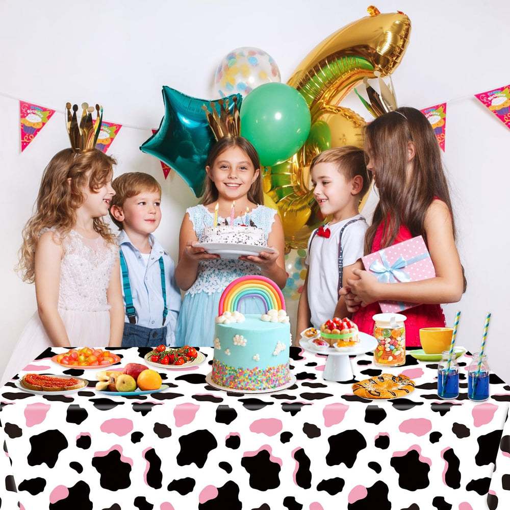 LINHAXM pink cow print tablecloth used as party decorations for a cowgirl theme