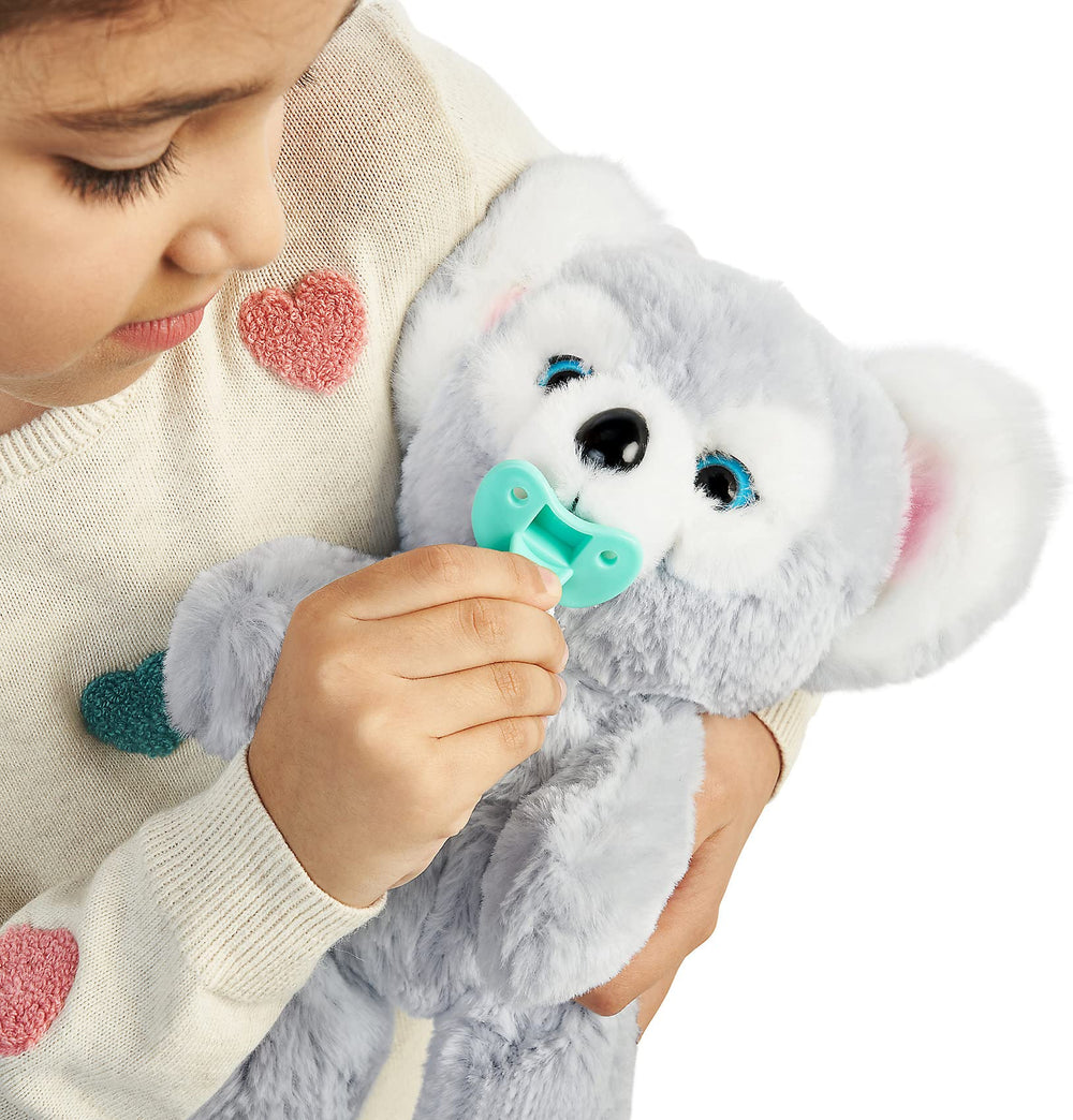 Cozy Dozy Kip Koala with blanket demonstrates the included bedtime accessory.