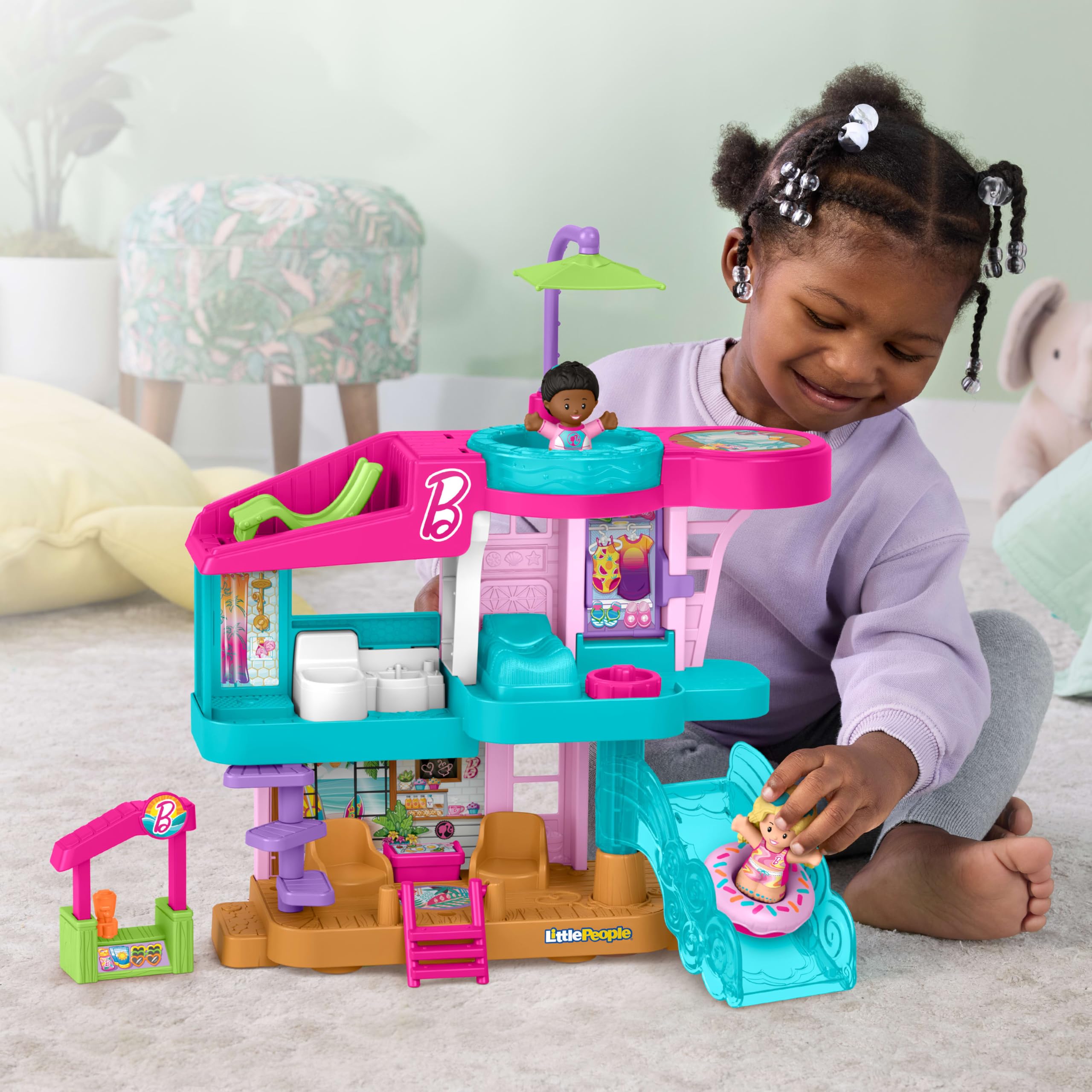 Wave-side action and donut swim ring for hands-on play