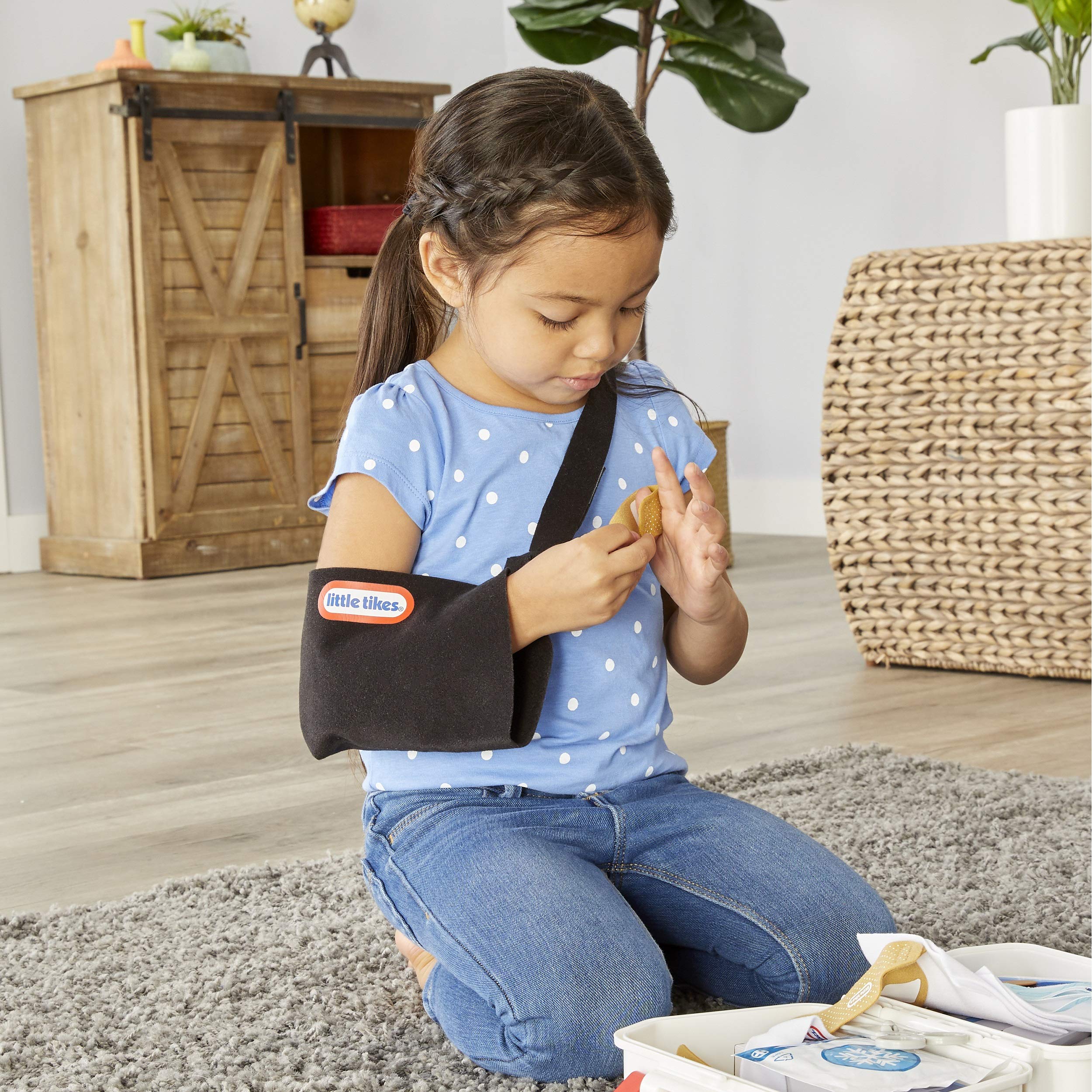 Little Tikes First Aid Kit ointment tube supports realistic care in role-play moments.