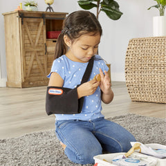 Little Tikes First Aid Kit ointment tube supports realistic care in role-play moments.
