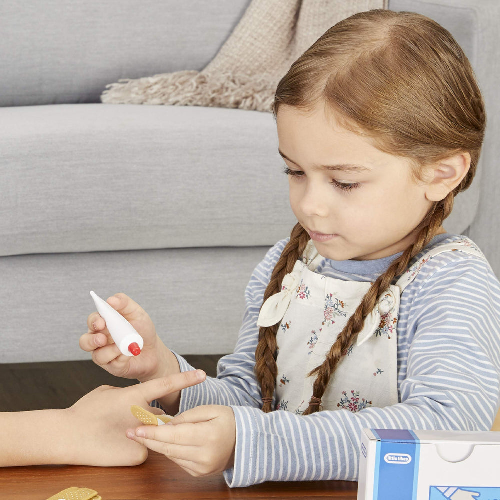 Little Tikes First Aid Kit thermometer records imagined vital checks in kid-friendly style.