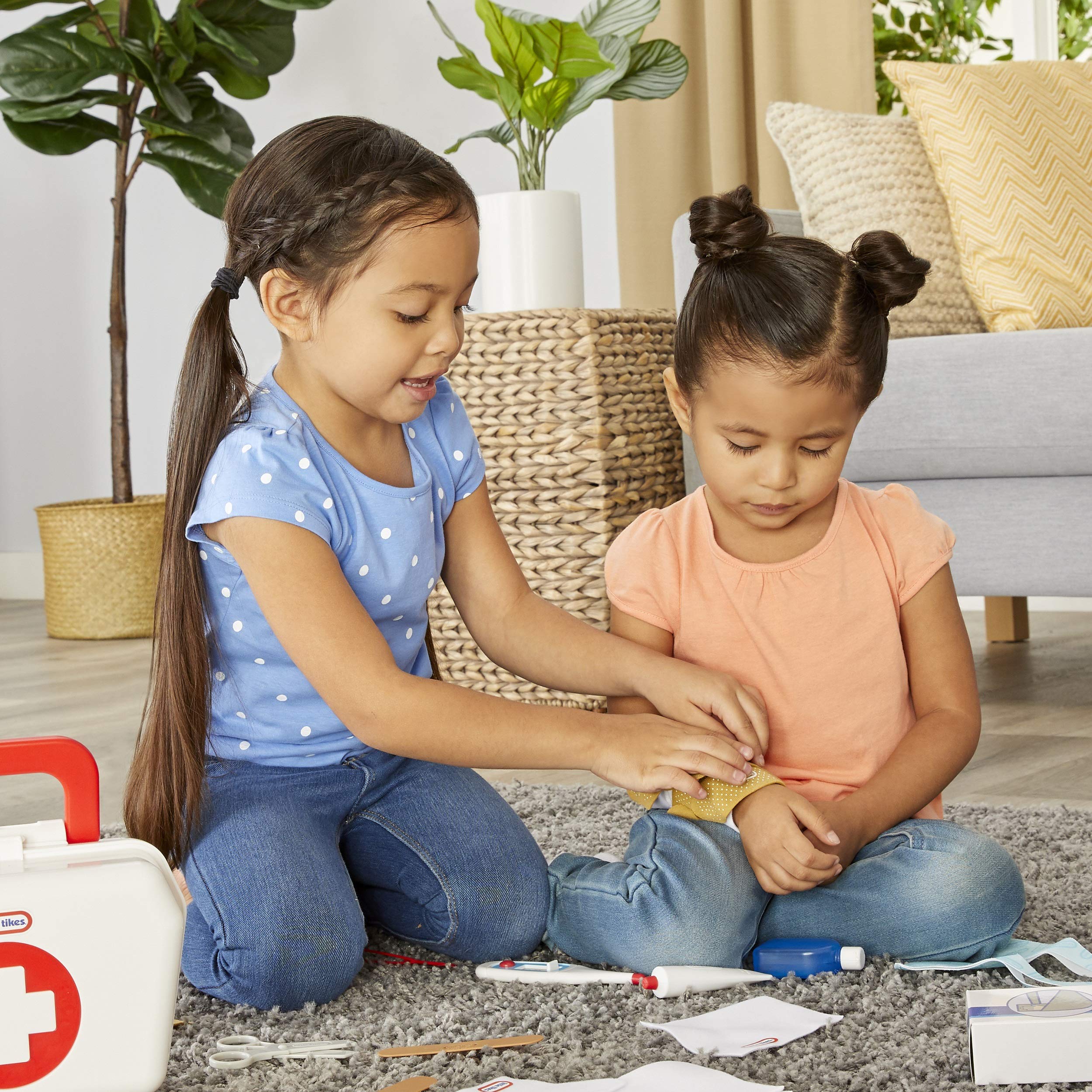 Little Tikes First Aid Kit tweezers for careful examination during playtime.