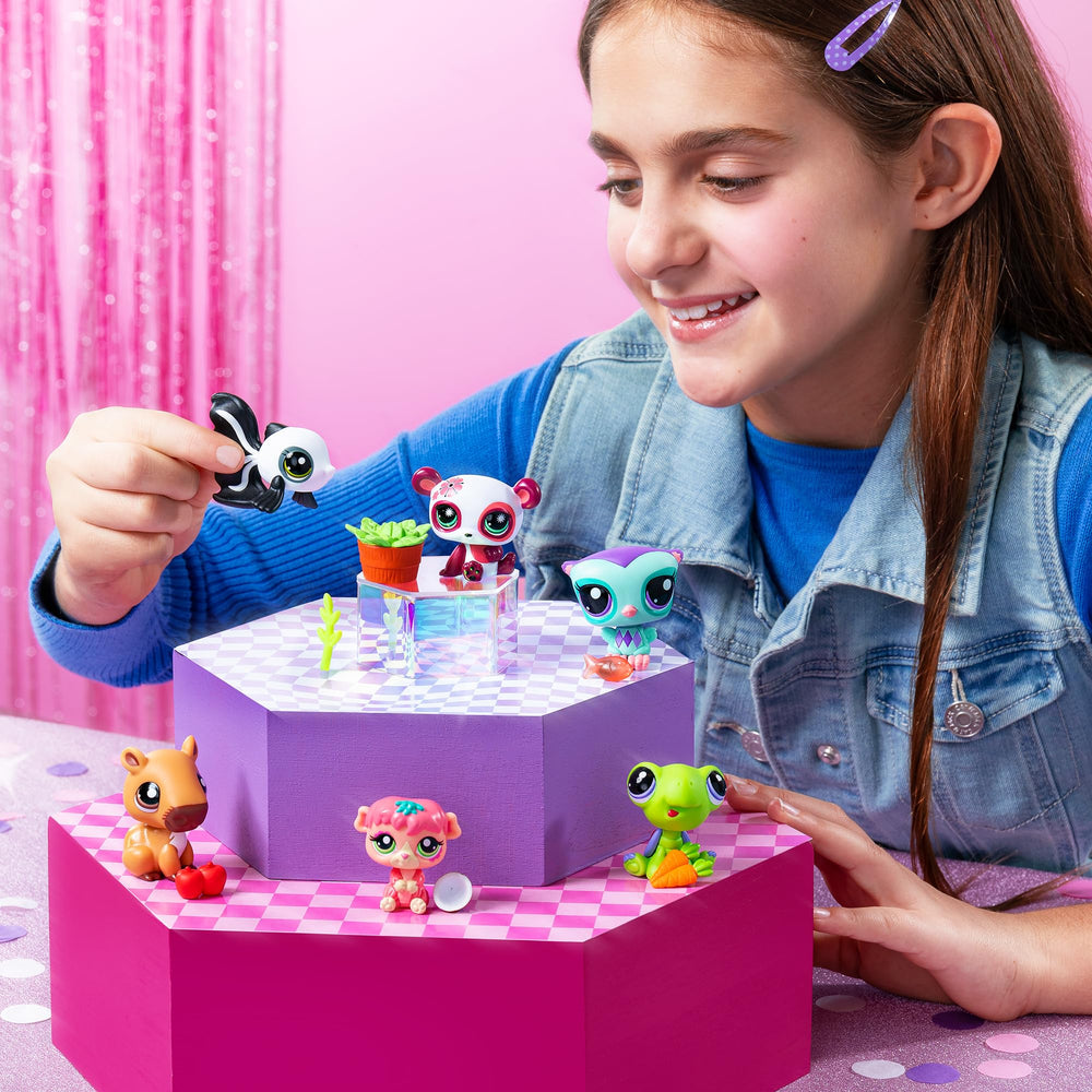 Littlest Pet Shop collector card reveals personality, level, and rarity.