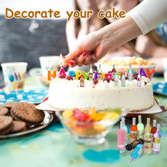 LLOUSSAK mini alcohol bottles provide vibrant cake decoration ideas.