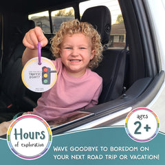 Children exploring outdoors with LMC Travel Edition scavenger hunt cards