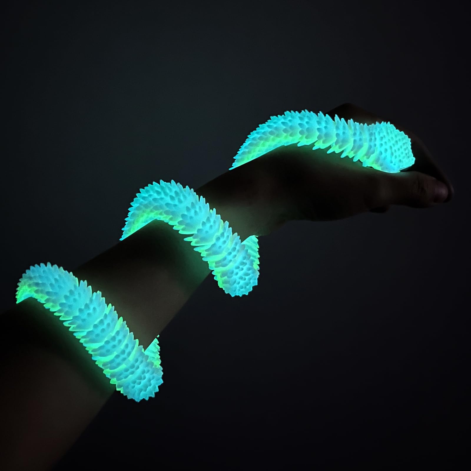 Lohoee luminous snake model shines under purple light for collectibles.