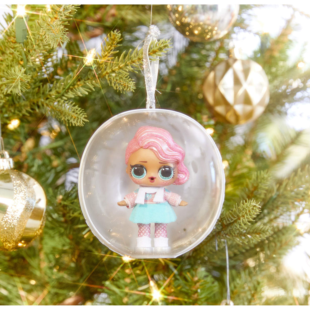 Limited edition glitter doll with wintery accessories for collectibility.