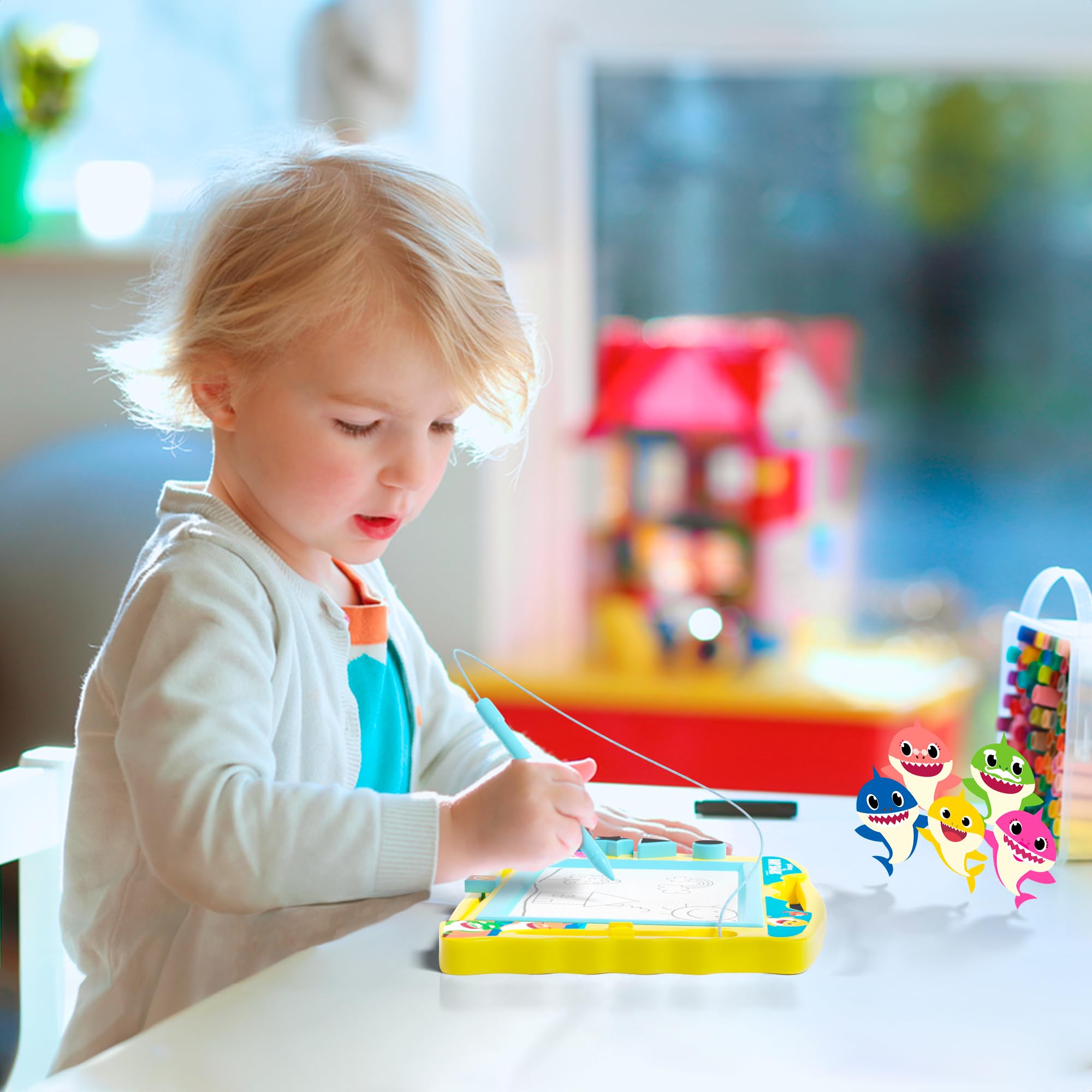 Lollipop Baby Shark drawing board in use by a kid for creative drawing